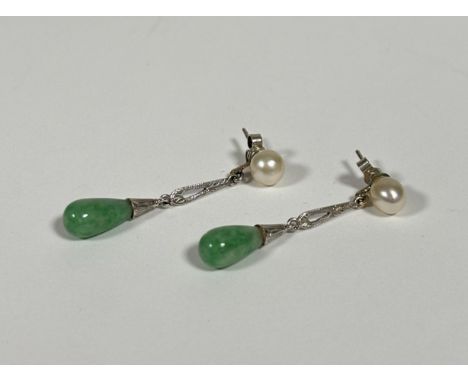 A pair of Chinese jadeite and cultured pearl drop earrings, the celadon tear-shaped drop suspended from an engraved white met