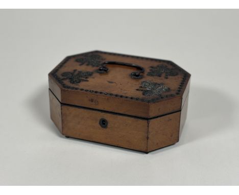 A&nbsp; satinwood sewing box with cut-steel decoration, early 19th century, of shaped octagonal form, the hinged lid embellis