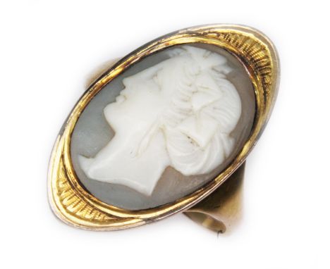 An early 19th century cameo ring, the head approx. 26mm x 14mm, initialled 'MC' otherwise unmarked, gross wt. 4.6g, size P.  