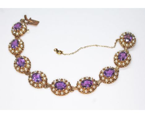 An amethyst and cultured pearl bracelet, nine clusters featuring a central oval mixed cut amethyst surrounded by ten pearls, 