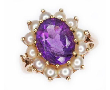 An amethyst and split pearl cluster ring, the oval cluster measuring approx. 17mm x 15mm, hallmarked 9ct gold, sponsor 'CJltd