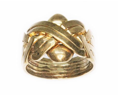 A hallmarked 9ct gold ring of knotted form, Sheffield 1999, wt. 13g, size W/X.  Condition - general wear throughout including