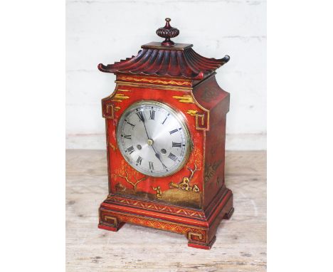 An early 20th century scarlet japanned chinoiserie mantle clock, pagoda top, unsigned 4 3/4" steel dial with Roman numerals, 