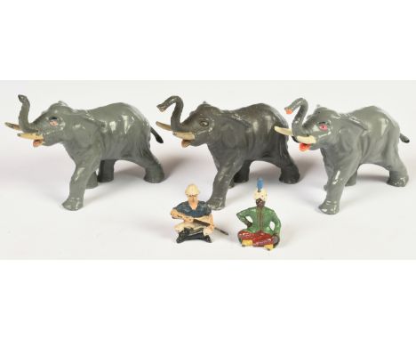 Timpo - A Group of Figures from the 'Big Game Hunting' Set. Circa 1950. Comprising: elephant, 'white hunter' &amp; 'Indian Ra