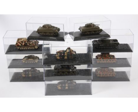 A Group of Miliary Vehicles in Display Cases. Approximately 1:76 scale. Conditions generally appear Near Mint overall, contai