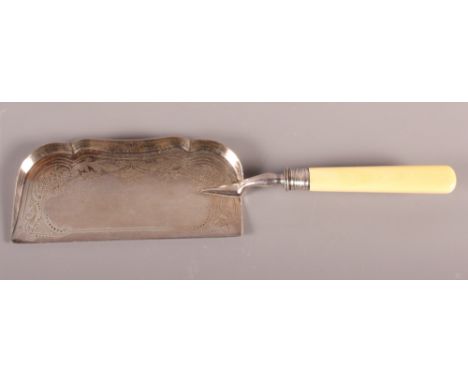 A late 19th Century ivory handled crumb scoop