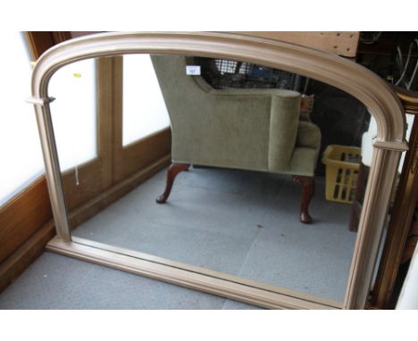 Two Victorian style arch top overmantel mirrors, in silvered and gilt frames