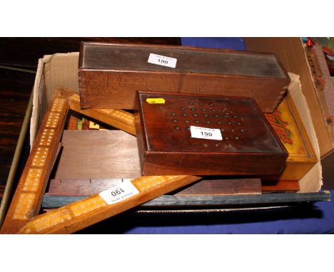A boxed set of bone and ebony dominoes, a set of draughts counters, cribbage boards, etc