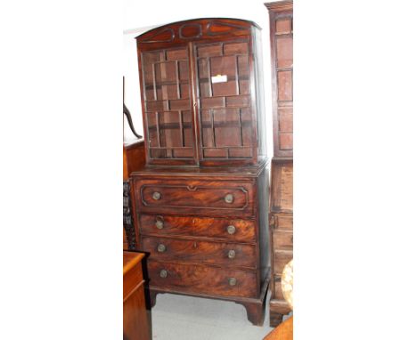 A 19th Century mahogany bureau bookcase with arch top enclosed two beaded glazed doors, base fitted secretaire drawer and thr