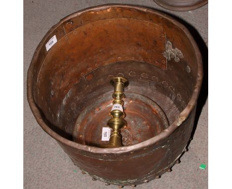 A copper log bin, a copper dish and a brass candlestick