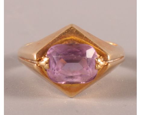 A 14ct gold and amethyst dress ring