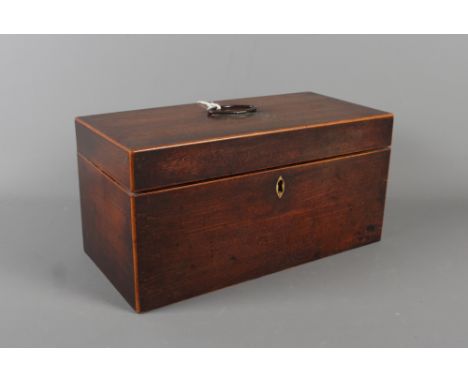 A Georgian mahogany and box line inlaid tea caddy, 11 1/2" wide
