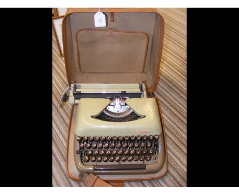A vintage Erika portable typewriter in carrying case