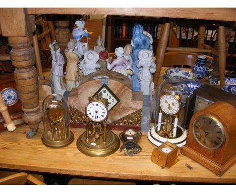 A French Art Deco mantel clock together with others