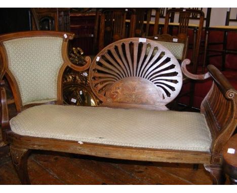 An Edwardian settee with shaped back rest and inlaid decorationCONDITION REPORTBy our judgement, condition of lot is fair, ha
