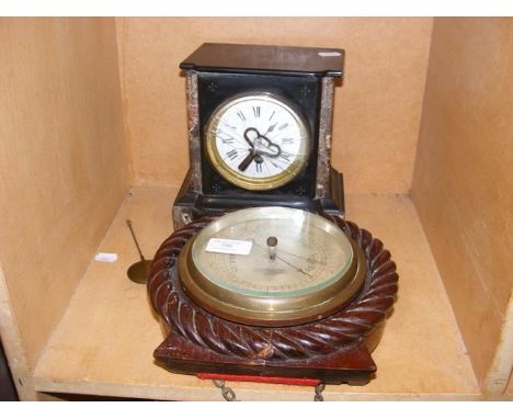 A Hughes &amp; Son of London barometer together with a mantle clock