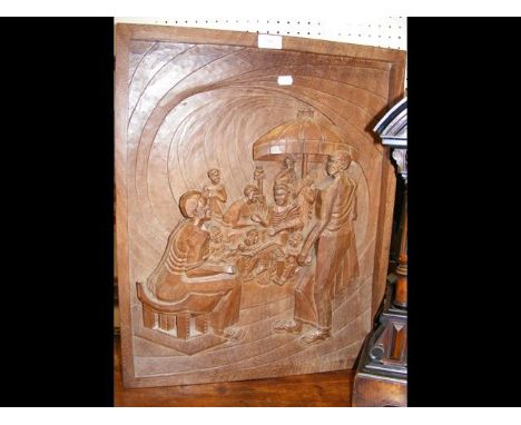A carved Oriental wooden panel depicting family scene = 60cm x 48cm