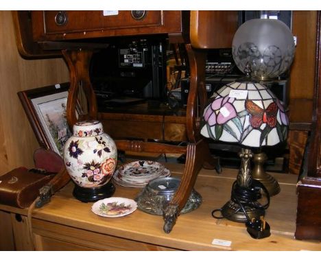 A Tiffany style lamp, ginger jar and cover etc