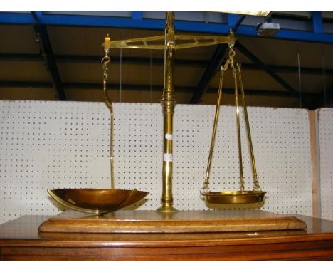 A set of antique brass scales