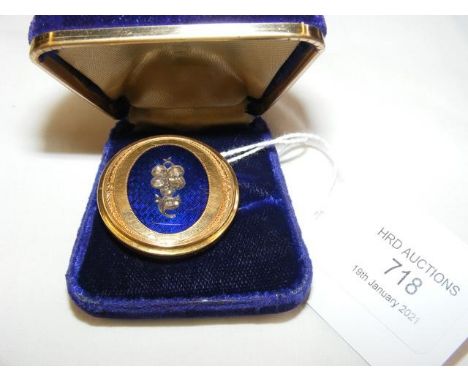 A ladies antique yellow metal blue enamel and diamond mounted brooch - 3cm diameterCONDITION REPORT8g weightseems in fair con