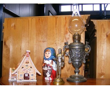 An oil lamp, russian dollCONDITION REPORTcondition of oil lamp is good, no signs of damage loss or repairinternal reservoir i
