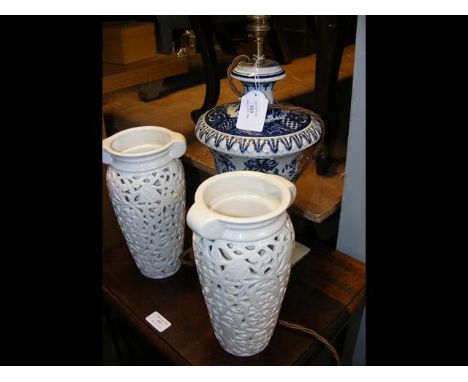 A pair of Oriental pierced vases together with a blue and white table lampCONDITION REPORTBy our judgement, overall condition