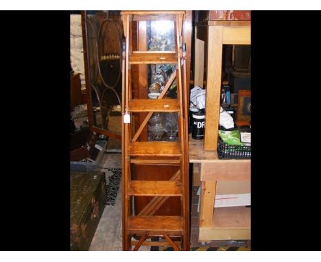 A set of vintage folding wooden step ladders - 170cms high