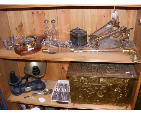 A wall light, kitchen scales, log bin etc (on two shelves)