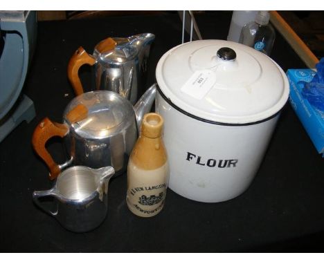 A vintage enamel flour container with lid, together with a New Langton stoneware bottle and three piece tea set