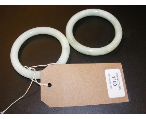 A pair of 8.5cm diameter jade banglesCONDITION REPORTWe have attached a number of additional images to showcase the lot in fu