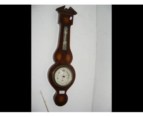An inlaid wall barometer/thermometer
