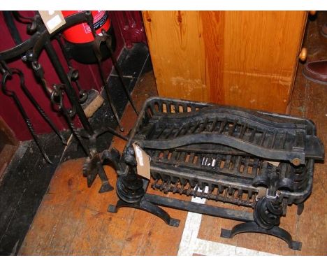 A cast iron fire grate, tools etc