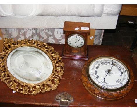 A circular antique barometer, inlaid mantel clock by Mappin &amp; Webb together with an ornate gilt hall mirrorCONDITION REPO