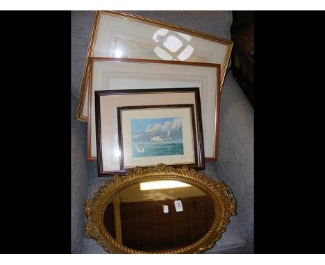 An oval wall mirror together with watercolours and prints