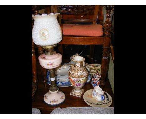 A Victorian oil lamp together with other ceramic ware