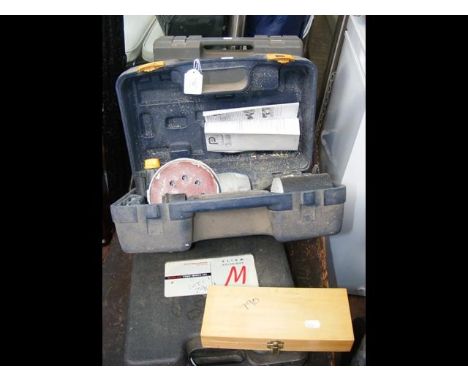 Various cased tools including orbital sanders