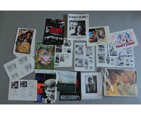 A Boxful of press books and cinema campaign books containing ad ranges and some lobby cards (including duplicates and cut-out