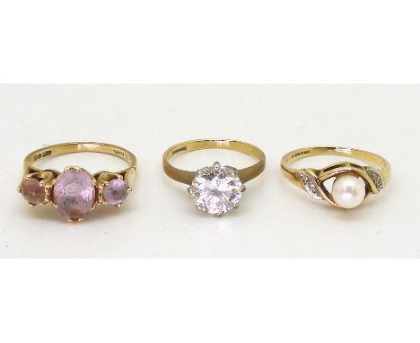 Three 9ct gold rings, amethyst, size K1/2, clear gem solitaire, size I1/2, pearl and diamond accent size K, weight together 5