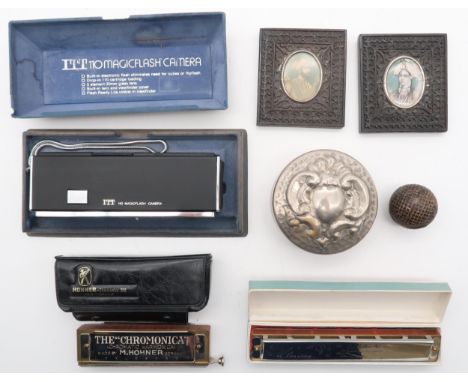 An eclectic mixed lot, to include a late-19th century gutty-type golf ball, two Indian portrait miniatures, painted on ivory 