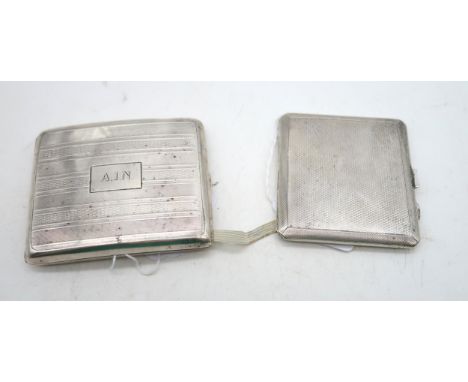 A George V silver cigarette case, by Walker &amp; Hall, Sheffield 1924, with engine turned decoration, monogrammed A I N,&nbs
