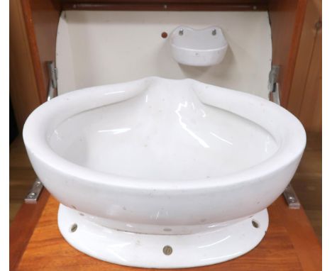 A 20th century teak wall mounted cabin sink with fall front compartment concealing ceramic basin and soap dish, 41cm high x 4