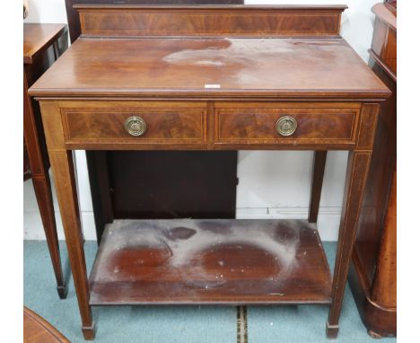 A late Victorian mahogany buffet table with two drawers on square tapering supports joined by lower tier shelf, 102cm high x 