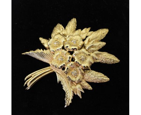 A floral spray brooch by Christian Dior, dimensions 10cm x 8cm, signed verso Condition Report:No condition report available.