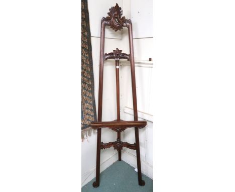 A 20th century carved hardwood folding easel, 197cm high x 59cm wide Condition Report:Available upon request