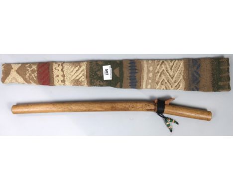 A First Nation pentatonic wooden flute. This instrument is from the collection of Jimmie MacGregor MBE. Musician, writer, bro
