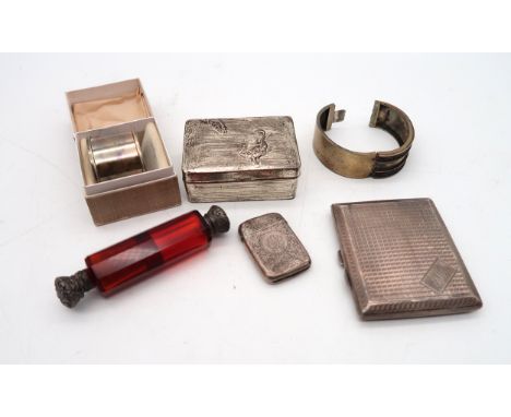 A collection of silver and white metal including a silver cigarette case, by F H Adams &amp; Co, Birmingham , of canted recta