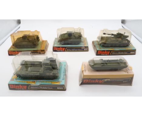 Five Dinky Toys military vehicles, in their original packaging, comprising 654 155mm Mobile Gun (x2), 691 Striker Anti-Tank V