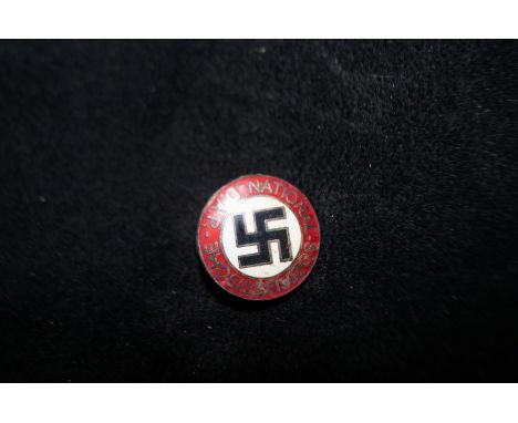 Enamel swastika badge