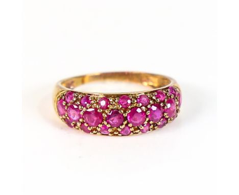 A modern 9ct gold ruby cluster half hoop ring, pave set with round-cut rubies, setting height 7.2mm, size P, 2.5gNo damage, a