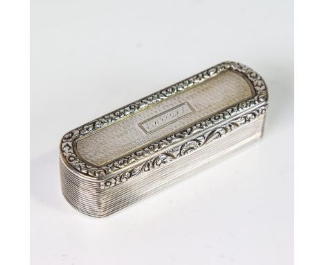 A George IV silver snuffbox, rounded rectangular form with ribbed and engine turned decoration and cast floral rim with gilt 